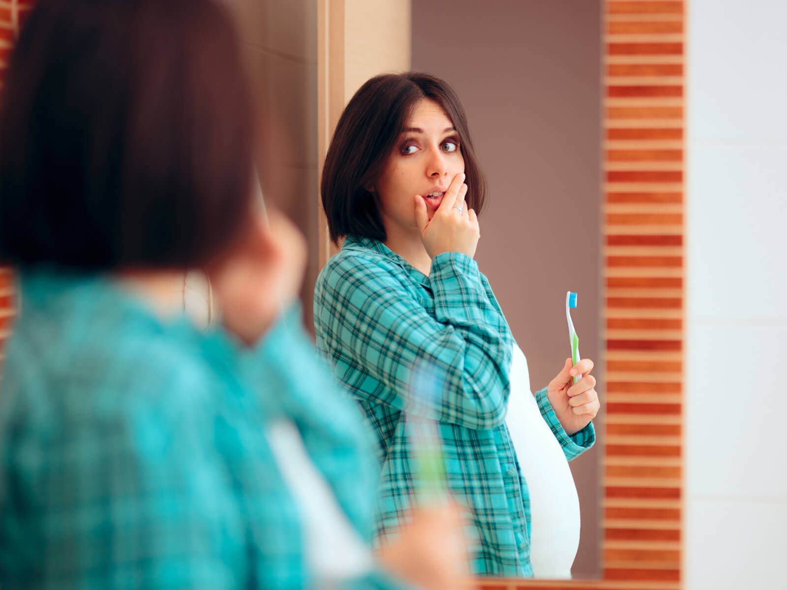 What You Do While Pregnant May Affect Your Child’s Mouth